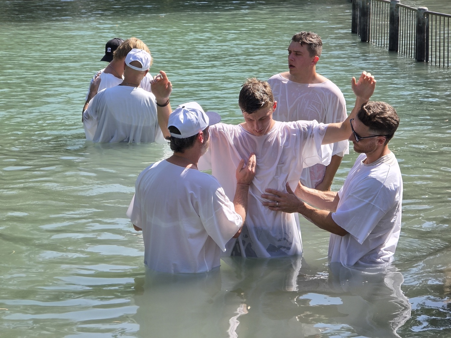 Praying together in the Jordan